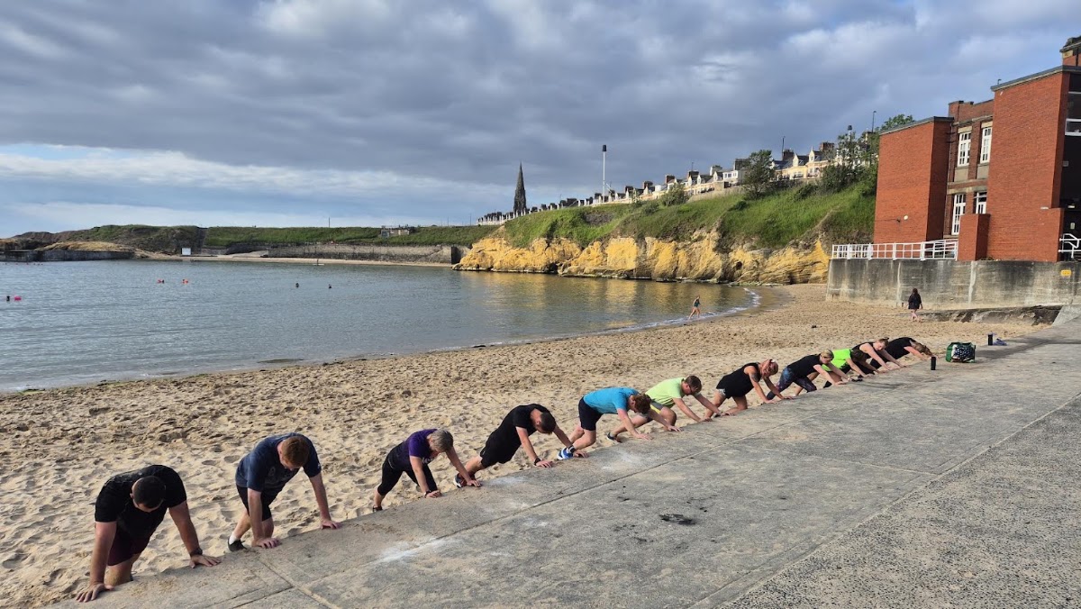 Incline press-ups along the Cullercoats promenade